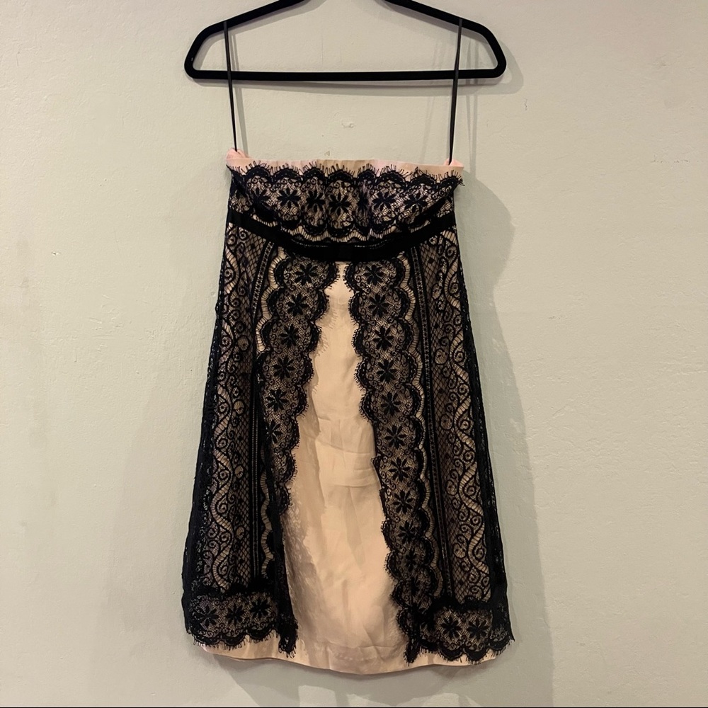 Blush pink and black lace mini dress
